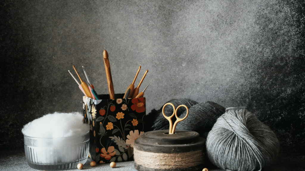Vintage crochet hooks and yarn showing the history of crochet